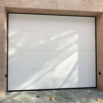 Porte de garage sectionnelle blanche RAL 9010