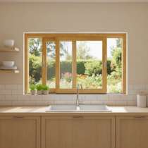 Fenêtre coulissante Bois 2 vantaux sur mesure vue depuis la cuisine